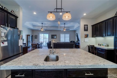 Welcome to 405 Greenway Dr in Kingman, Arizona! This stunning on Cerbat Cliffs Golf Course in Arizona - for sale on GolfHomes.com, golf home, golf lot