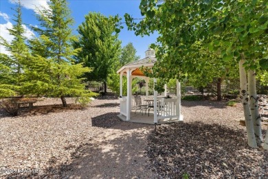 Welcome to this stunning single-level home nestled in The Dells on Prescott Lakes Golf and Country Club in Arizona - for sale on GolfHomes.com, golf home, golf lot