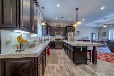 Welcome to 405 Greenway Dr in Kingman, Arizona! This stunning on Cerbat Cliffs Golf Course in Arizona - for sale on GolfHomes.com, golf home, golf lot