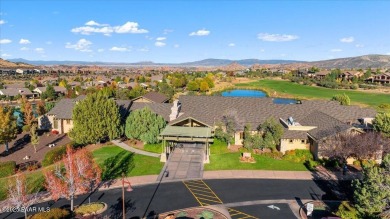 Welcome to this stunning single-level home nestled in The Dells on Prescott Lakes Golf and Country Club in Arizona - for sale on GolfHomes.com, golf home, golf lot