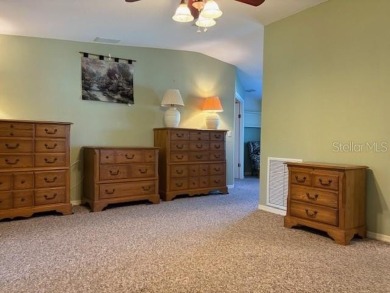 Come and take a look at this large triple-wide manufactured home on Country Club of Mount Dora in Florida - for sale on GolfHomes.com, golf home, golf lot