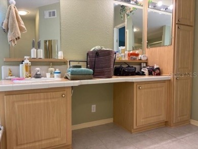 Come and take a look at this large triple-wide manufactured home on Country Club of Mount Dora in Florida - for sale on GolfHomes.com, golf home, golf lot