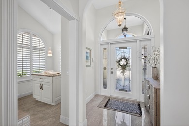 Completely renovated pool home nestled on spectacular golf on Bear Lakes Country Club in Florida - for sale on GolfHomes.com, golf home, golf lot