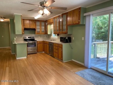 Adjacent to the Meadowlands Golf Course and nestled amongst the on Meadowlands Golf Club in North Carolina - for sale on GolfHomes.com, golf home, golf lot