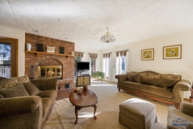 Charming home in the heart of Spearfish! Located just blocks on Spearfish Canyon Country Club in South Dakota - for sale on GolfHomes.com, golf home, golf lot