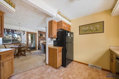 Charming home in the heart of Spearfish! Located just blocks on Spearfish Canyon Country Club in South Dakota - for sale on GolfHomes.com, golf home, golf lot