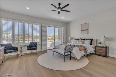 The windows open wide to the sun and the long, green stretch of on Canyon Gate Country Club in Nevada - for sale on GolfHomes.com, golf home, golf lot