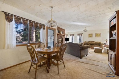 Charming home in the heart of Spearfish! Located just blocks on Spearfish Canyon Country Club in South Dakota - for sale on GolfHomes.com, golf home, golf lot