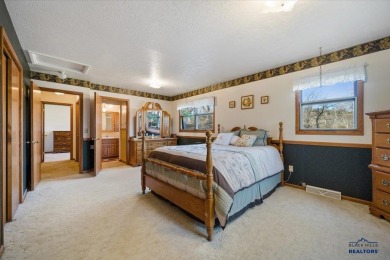 Charming home in the heart of Spearfish! Located just blocks on Spearfish Canyon Country Club in South Dakota - for sale on GolfHomes.com, golf home, golf lot