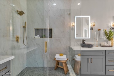 The windows open wide to the sun and the long, green stretch of on Canyon Gate Country Club in Nevada - for sale on GolfHomes.com, golf home, golf lot