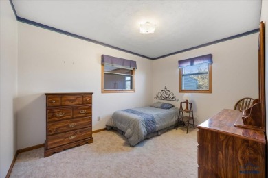 Charming home in the heart of Spearfish! Located just blocks on Spearfish Canyon Country Club in South Dakota - for sale on GolfHomes.com, golf home, golf lot