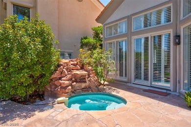 The windows open wide to the sun and the long, green stretch of on Canyon Gate Country Club in Nevada - for sale on GolfHomes.com, golf home, golf lot