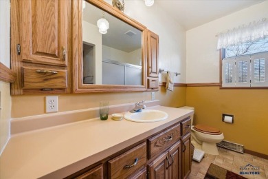 Charming home in the heart of Spearfish! Located just blocks on Spearfish Canyon Country Club in South Dakota - for sale on GolfHomes.com, golf home, golf lot