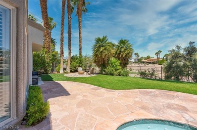 The windows open wide to the sun and the long, green stretch of on Canyon Gate Country Club in Nevada - for sale on GolfHomes.com, golf home, golf lot