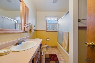 Charming home in the heart of Spearfish! Located just blocks on Spearfish Canyon Country Club in South Dakota - for sale on GolfHomes.com, golf home, golf lot