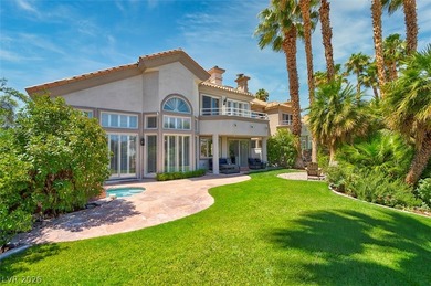 The windows open wide to the sun and the long, green stretch of on Canyon Gate Country Club in Nevada - for sale on GolfHomes.com, golf home, golf lot