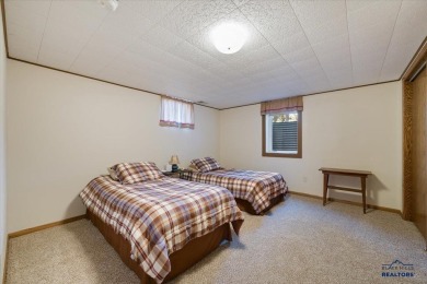 Charming home in the heart of Spearfish! Located just blocks on Spearfish Canyon Country Club in South Dakota - for sale on GolfHomes.com, golf home, golf lot