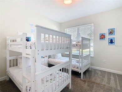 A turn-key, fully furnished ChampionsGate escape offering the on National Golf Course in Florida - for sale on GolfHomes.com, golf home, golf lot