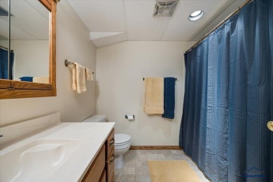 Charming home in the heart of Spearfish! Located just blocks on Spearfish Canyon Country Club in South Dakota - for sale on GolfHomes.com, golf home, golf lot