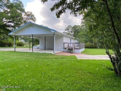 Adjacent to the Meadowlands Golf Course and nestled amongst the on Meadowlands Golf Club in North Carolina - for sale on GolfHomes.com, golf home, golf lot