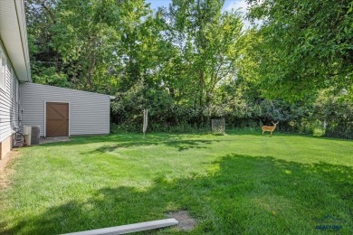 Charming home in the heart of Spearfish! Located just blocks on Spearfish Canyon Country Club in South Dakota - for sale on GolfHomes.com, golf home, golf lot