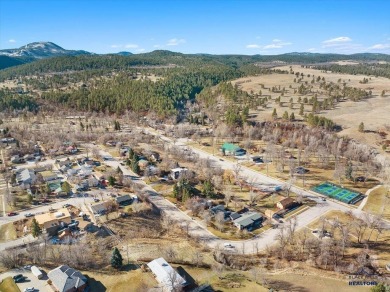 Charming home in the heart of Spearfish! Located just blocks on Spearfish Canyon Country Club in South Dakota - for sale on GolfHomes.com, golf home, golf lot