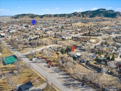 Charming home in the heart of Spearfish! Located just blocks on Spearfish Canyon Country Club in South Dakota - for sale on GolfHomes.com, golf home, golf lot
