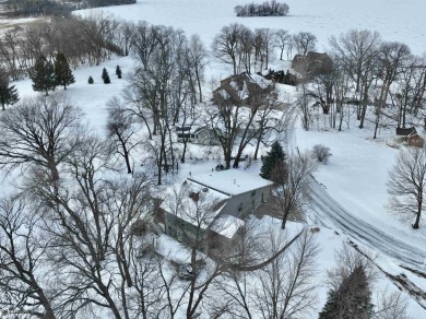 CAPTIVATING RESIDENCE ON 3 SPACIOUS LOTS--A NATURE LOVER'S on Rice Lake Golf and Country Club in Iowa - for sale on GolfHomes.com, golf home, golf lot