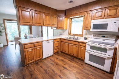 CAPTIVATING RESIDENCE ON 3 SPACIOUS LOTS--A NATURE LOVER'S on Rice Lake Golf and Country Club in Iowa - for sale on GolfHomes.com, golf home, golf lot