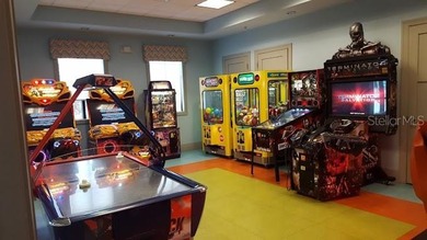 A turn-key, fully furnished ChampionsGate escape offering the on National Golf Course in Florida - for sale on GolfHomes.com, golf home, golf lot