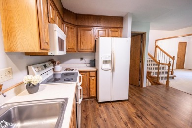 CAPTIVATING RESIDENCE ON 3 SPACIOUS LOTS--A NATURE LOVER'S on Rice Lake Golf and Country Club in Iowa - for sale on GolfHomes.com, golf home, golf lot