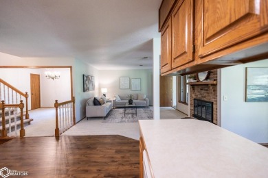 CAPTIVATING RESIDENCE ON 3 SPACIOUS LOTS--A NATURE LOVER'S on Rice Lake Golf and Country Club in Iowa - for sale on GolfHomes.com, golf home, golf lot