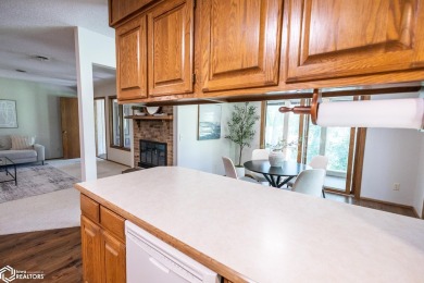 CAPTIVATING RESIDENCE ON 3 SPACIOUS LOTS--A NATURE LOVER'S on Rice Lake Golf and Country Club in Iowa - for sale on GolfHomes.com, golf home, golf lot