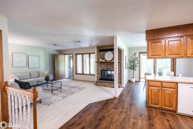 CAPTIVATING RESIDENCE ON 3 SPACIOUS LOTS--A NATURE LOVER'S on Rice Lake Golf and Country Club in Iowa - for sale on GolfHomes.com, golf home, golf lot