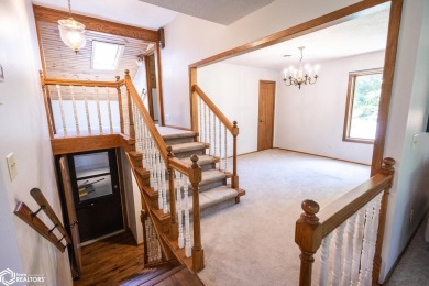 CAPTIVATING RESIDENCE ON 3 SPACIOUS LOTS--A NATURE LOVER'S on Rice Lake Golf and Country Club in Iowa - for sale on GolfHomes.com, golf home, golf lot