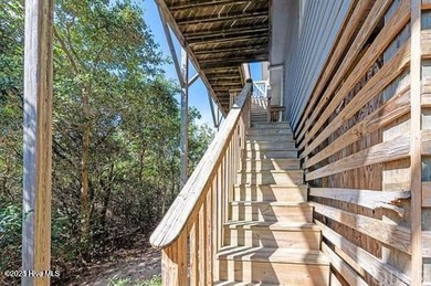 Sitting well elevated in an X flood zone, Sunny Days is located on The Currituck Golf Club in North Carolina - for sale on GolfHomes.com, golf home, golf lot