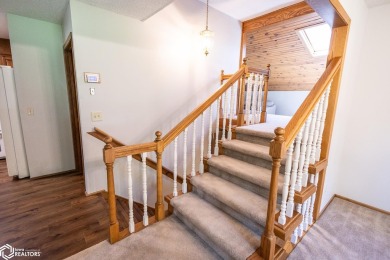 CAPTIVATING RESIDENCE ON 3 SPACIOUS LOTS--A NATURE LOVER'S on Rice Lake Golf and Country Club in Iowa - for sale on GolfHomes.com, golf home, golf lot