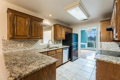 Tucked into a prime corner lot inside the gated paradise of on Pecan Plantation Country Club in Texas - for sale on GolfHomes.com, golf home, golf lot