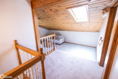 CAPTIVATING RESIDENCE ON 3 SPACIOUS LOTS--A NATURE LOVER'S on Rice Lake Golf and Country Club in Iowa - for sale on GolfHomes.com, golf home, golf lot