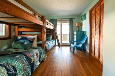 Sitting well elevated in an X flood zone, Sunny Days is located on The Currituck Golf Club in North Carolina - for sale on GolfHomes.com, golf home, golf lot