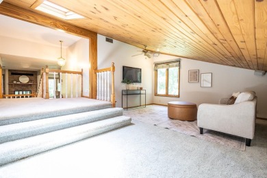 CAPTIVATING RESIDENCE ON 3 SPACIOUS LOTS--A NATURE LOVER'S on Rice Lake Golf and Country Club in Iowa - for sale on GolfHomes.com, golf home, golf lot