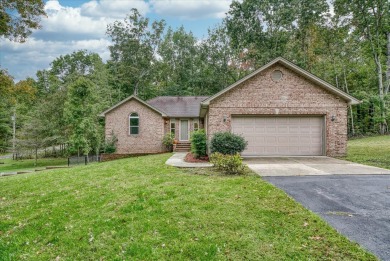 This beautiful brick BASEMENT RANCH home, nestled on 2 lots in on Lake Tansi Village Country Club in Tennessee - for sale on GolfHomes.com, golf home, golf lot