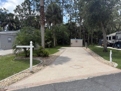 Enjoy resort-style living with this beautifully maintained RV on The Great Outdoors Golf and Country Club in Florida - for sale on GolfHomes.com, golf home, golf lot
