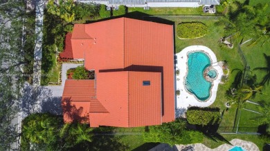 Elegant two-story home located in the prestigious Weston Hills on Weston Hills Country Club in Florida - for sale on GolfHomes.com, golf home, golf lot