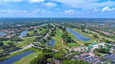 Elegant two-story home located in the prestigious Weston Hills on Weston Hills Country Club in Florida - for sale on GolfHomes.com, golf home, golf lot