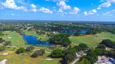 Elegant two-story home located in the prestigious Weston Hills on Weston Hills Country Club in Florida - for sale on GolfHomes.com, golf home, golf lot