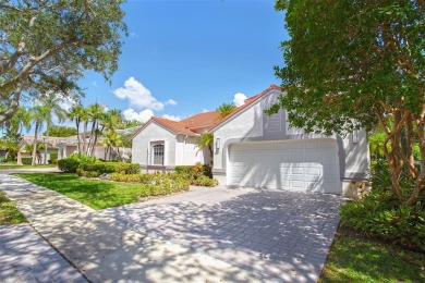 Elegant two-story home located in the prestigious Weston Hills on Weston Hills Country Club in Florida - for sale on GolfHomes.com, golf home, golf lot