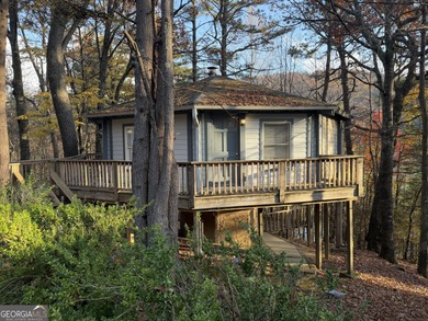 Nestled deep in Sky Valley's peaceful golf enclave, this on Sky Valley Resort and Country Club in Georgia - for sale on GolfHomes.com, golf home, golf lot