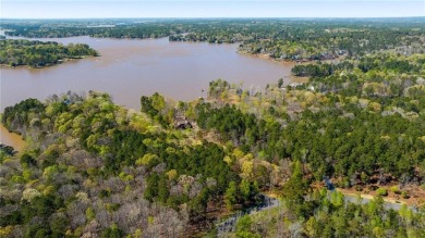 This exclusive +/- 5.43-acre lakefront lot promises privacy and on Reynolds Lake Oconee - The Oconee in Georgia - for sale on GolfHomes.com, golf home, golf lot