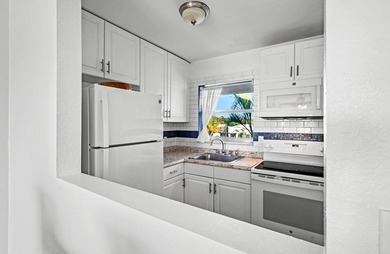 Move-in ready 1/1 condo on golf course in 55+ community. Kitchen on  in Florida - for sale on GolfHomes.com, golf home, golf lot